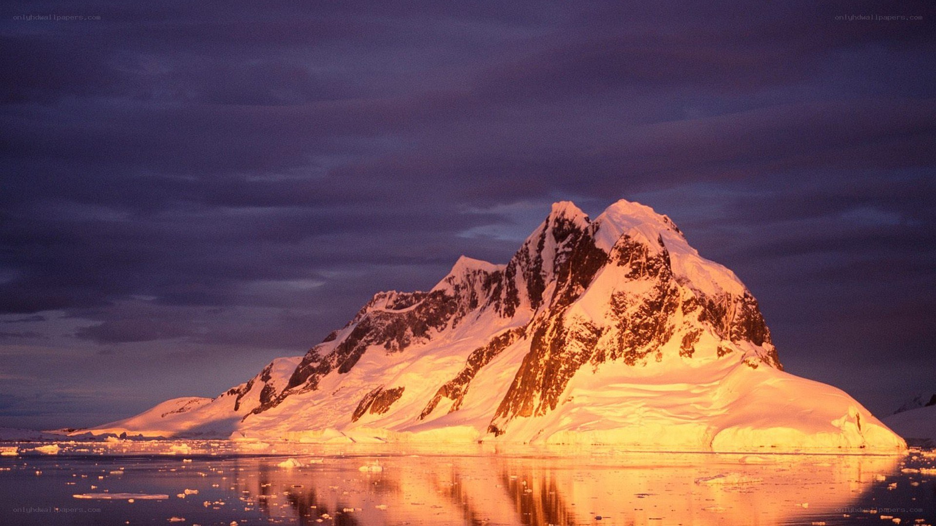 Antarctic mountain at sunset