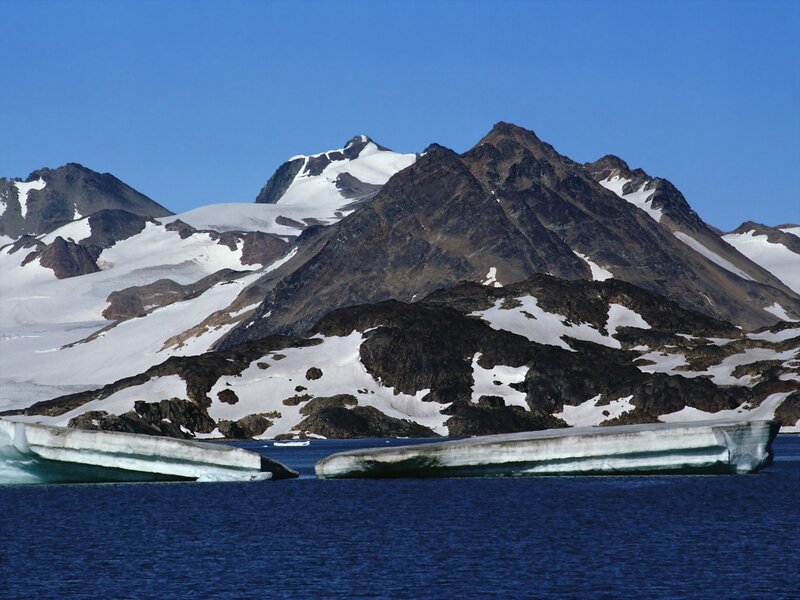 Antarctic mountains and icebergs