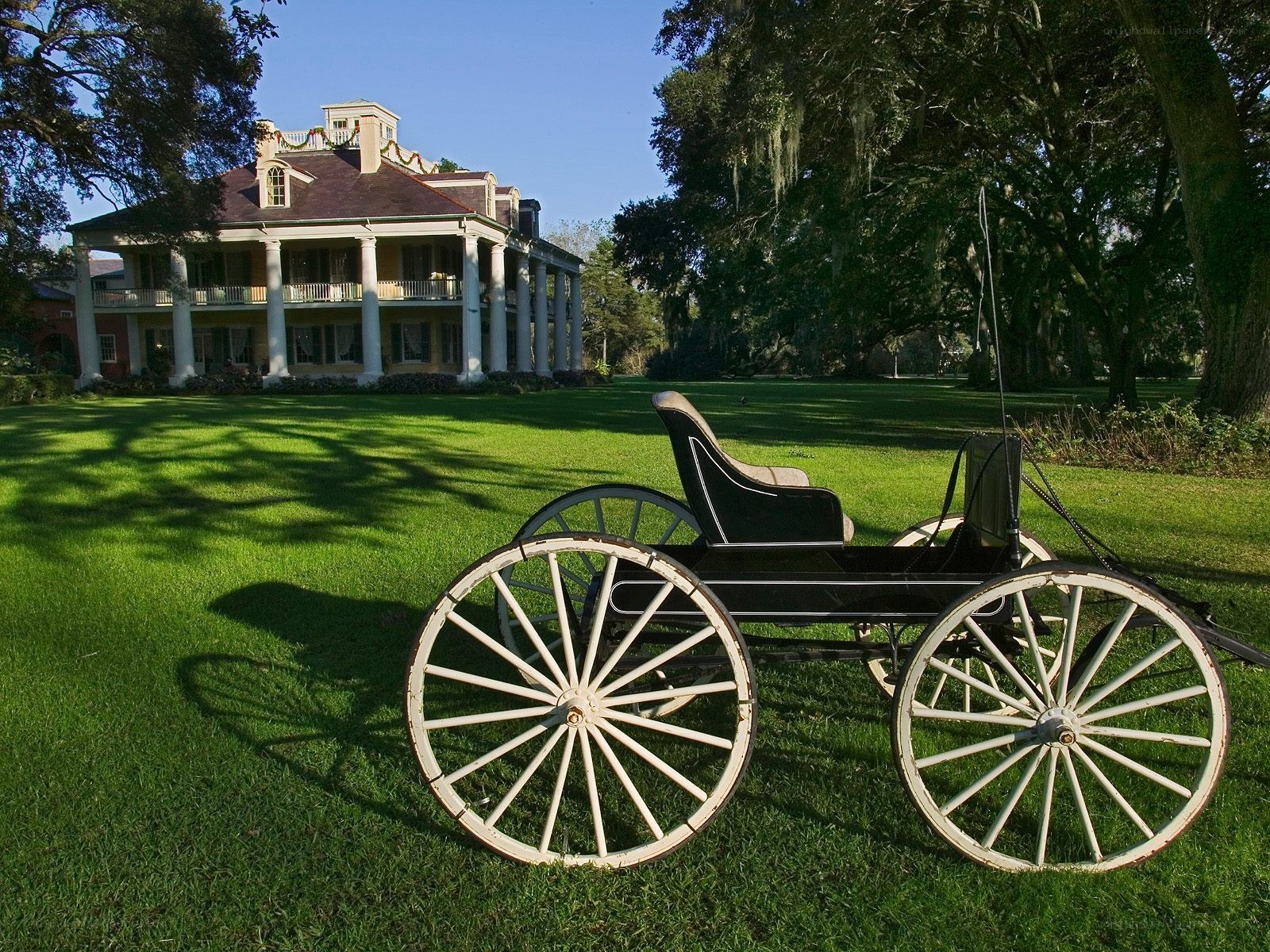 antebellum mansion with carriage