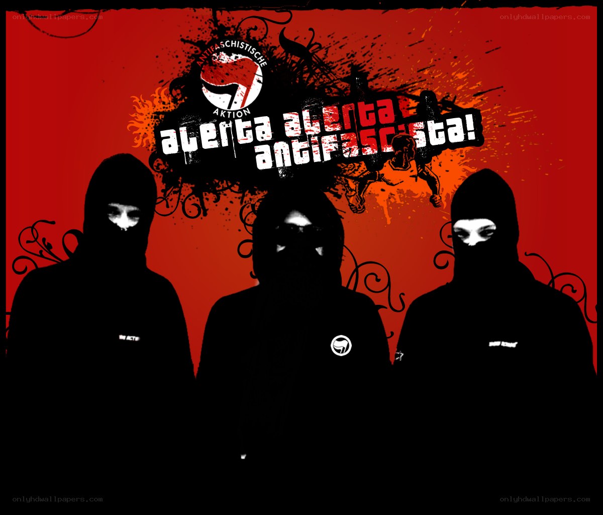 Anti-fascist activists with slogan