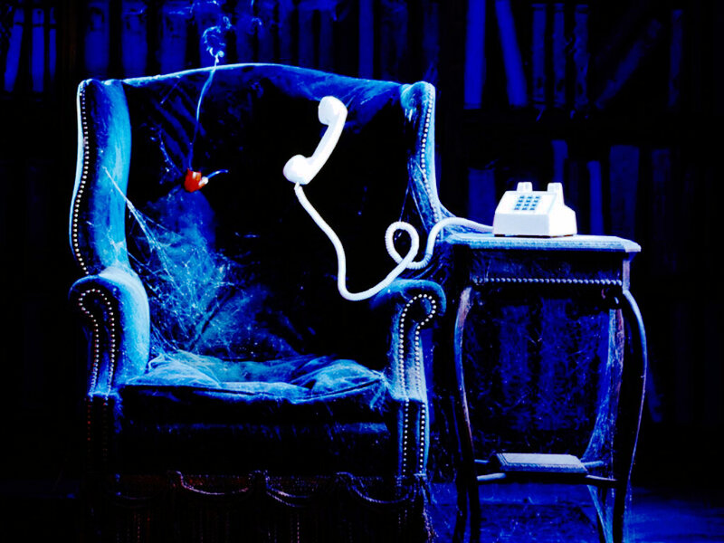 Antique Armchair with Telephone
