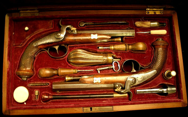 Antique Flintlock Pistols — Brown