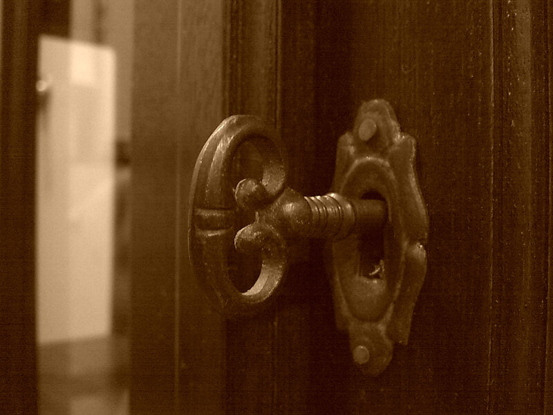 antique key in wooden door