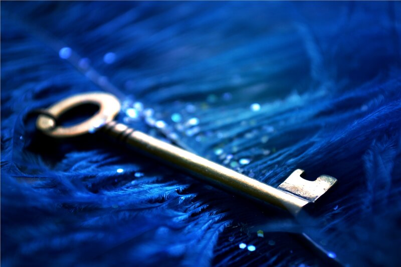 Antique Key on Feathers