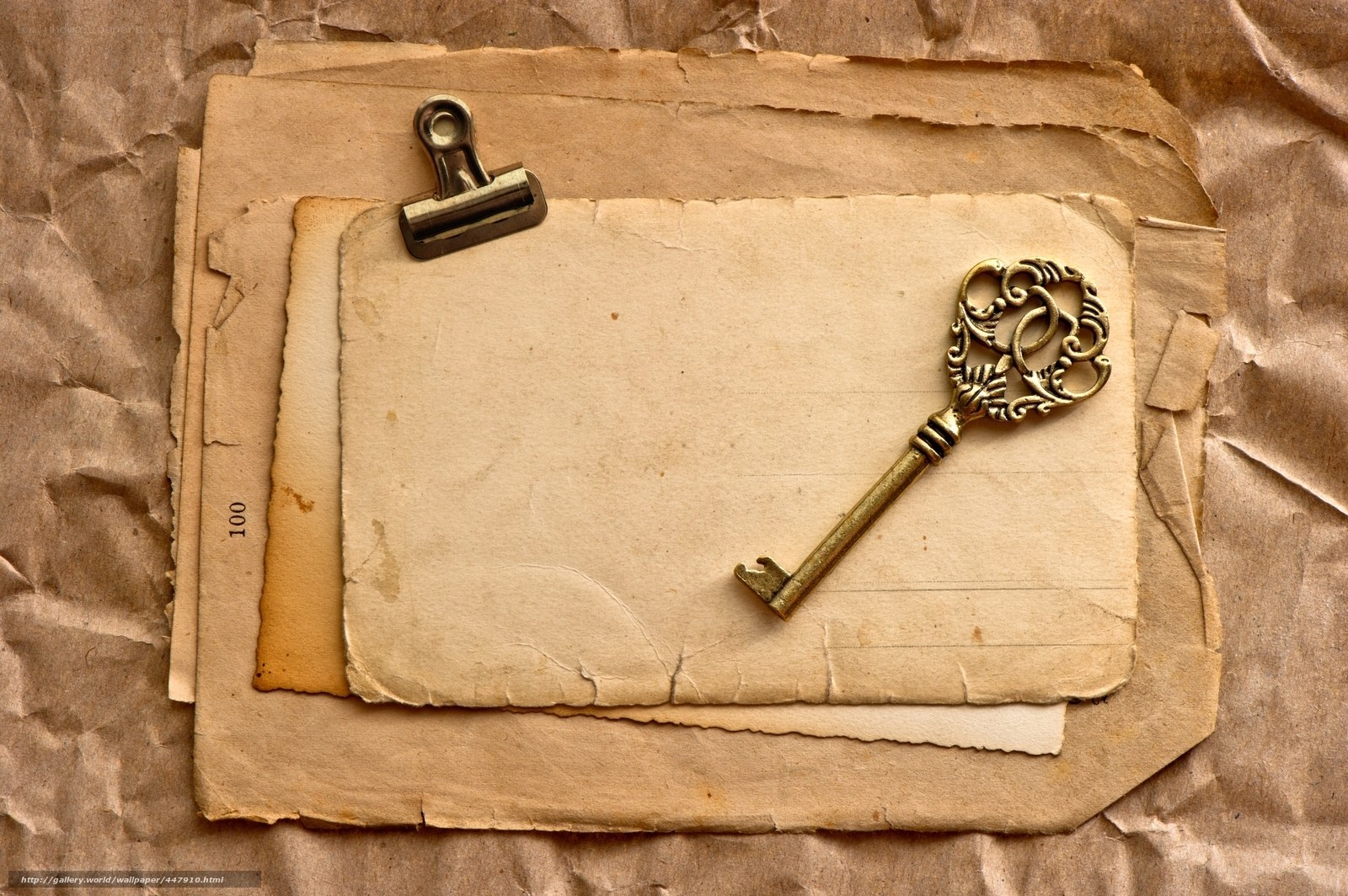 antique key on old paper