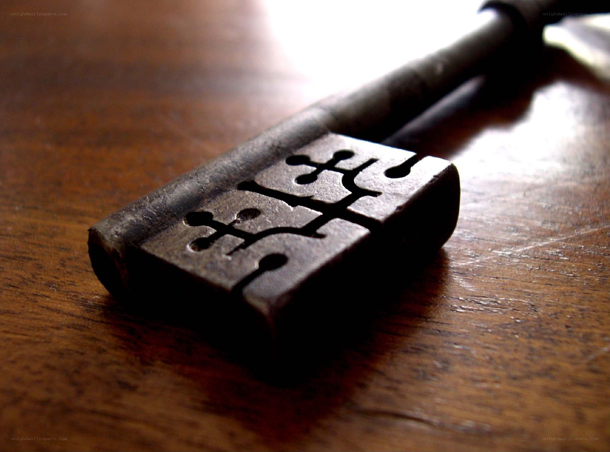 antique key on wooden surface