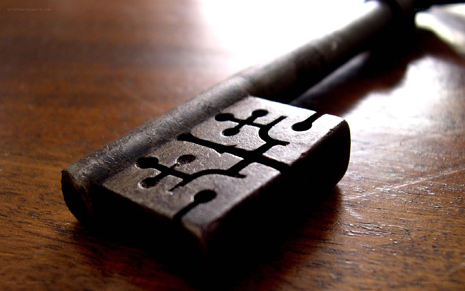 antique key on wooden surface
