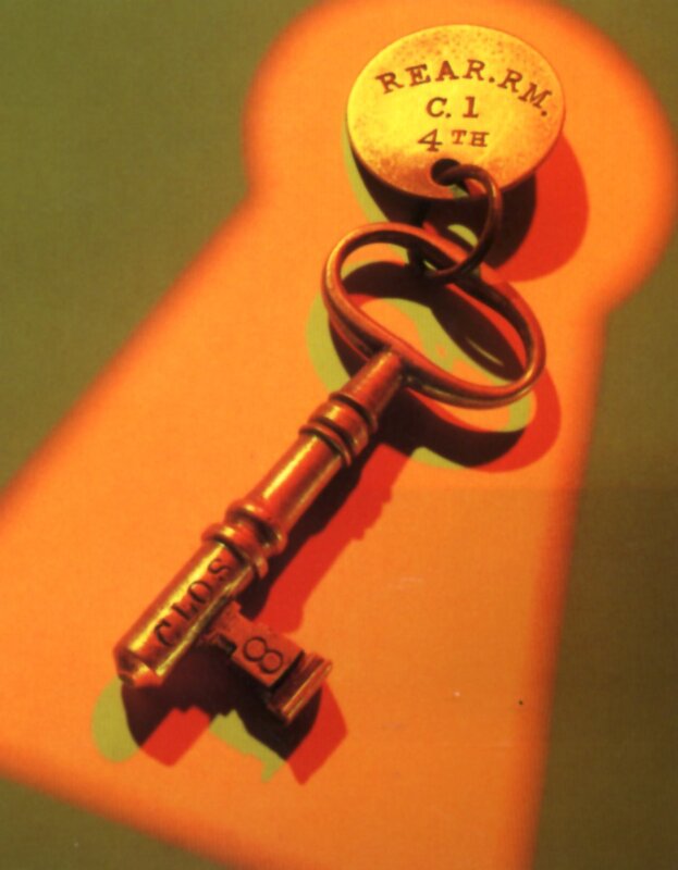 Antique key with engraved tag