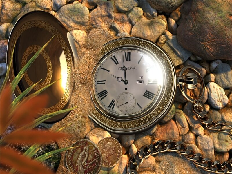 antique pocket watch on pebbles