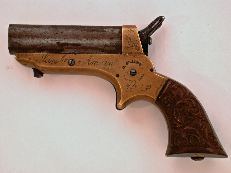 antique revolver with engraved details