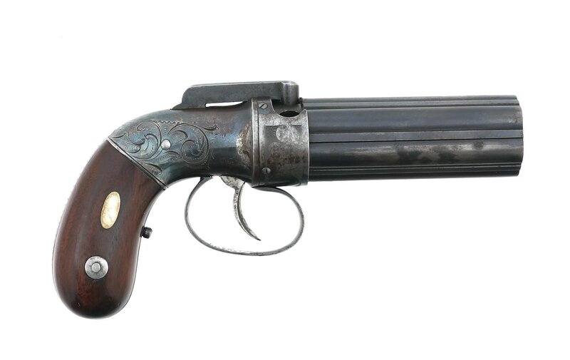 antique revolver with ornate grip