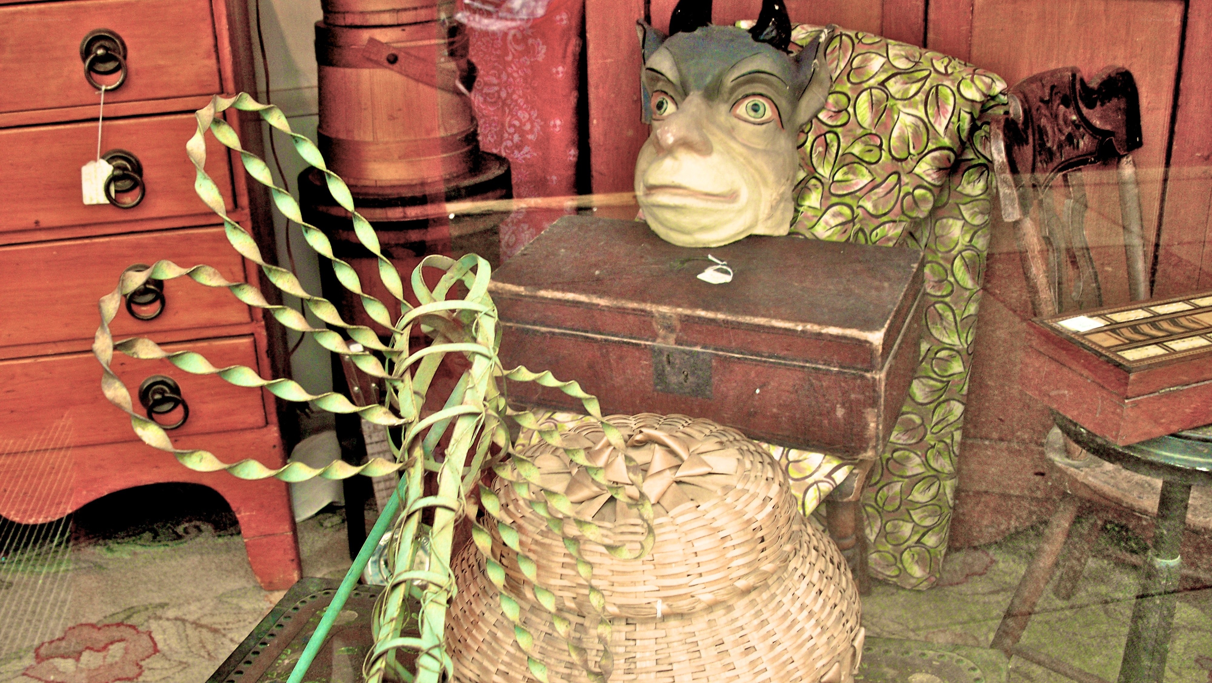 antique shop display with mask