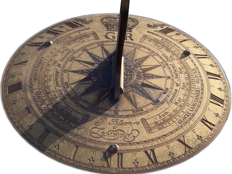 antique sundial with compass
