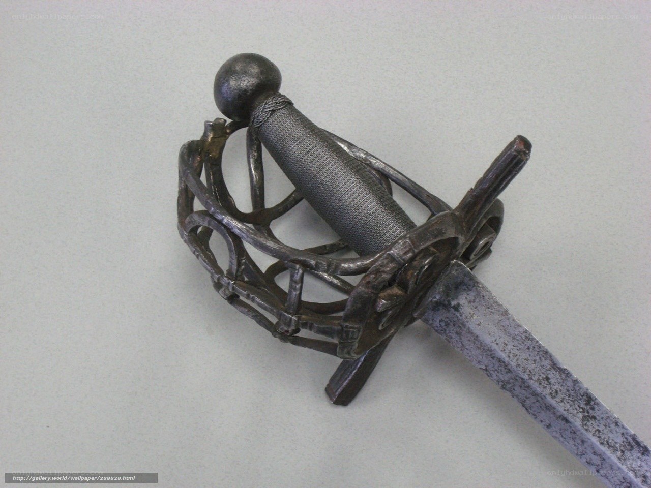 antique sword with basket hilt