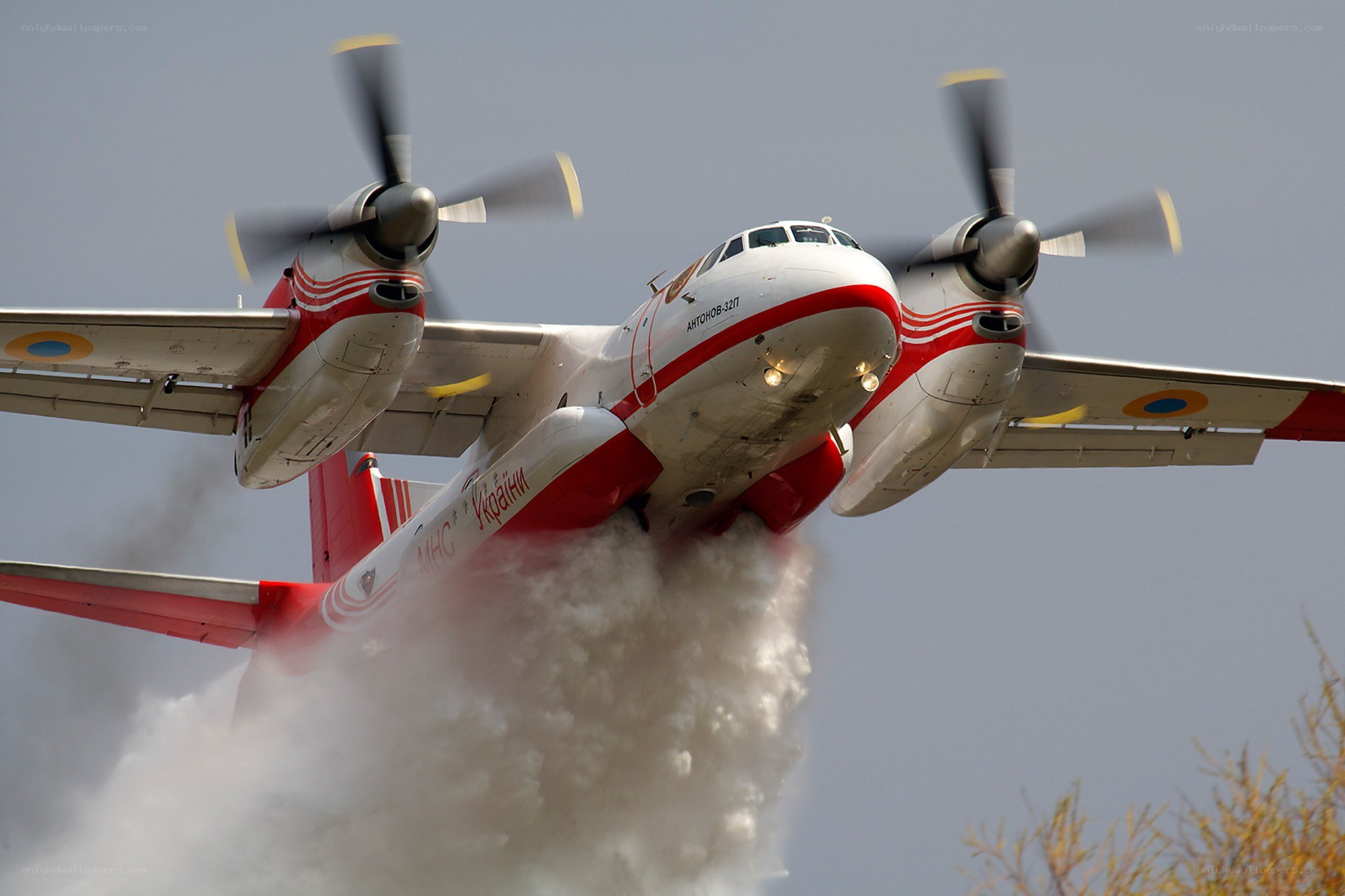 Antonov An-32P dropping water