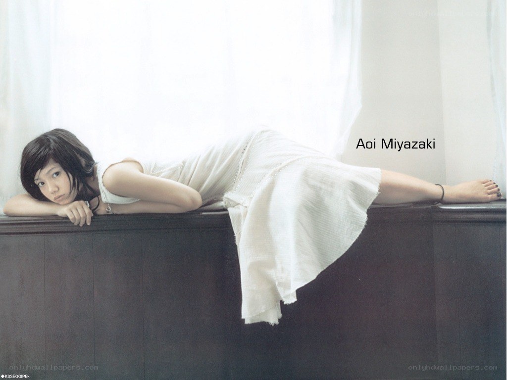 Aoi Miyazaki lying on a surface