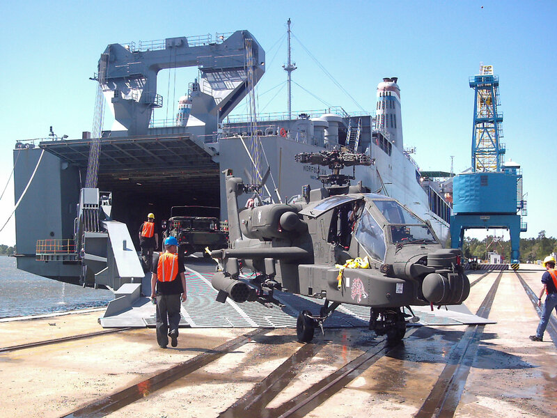 Apache helicopter loading onto ship