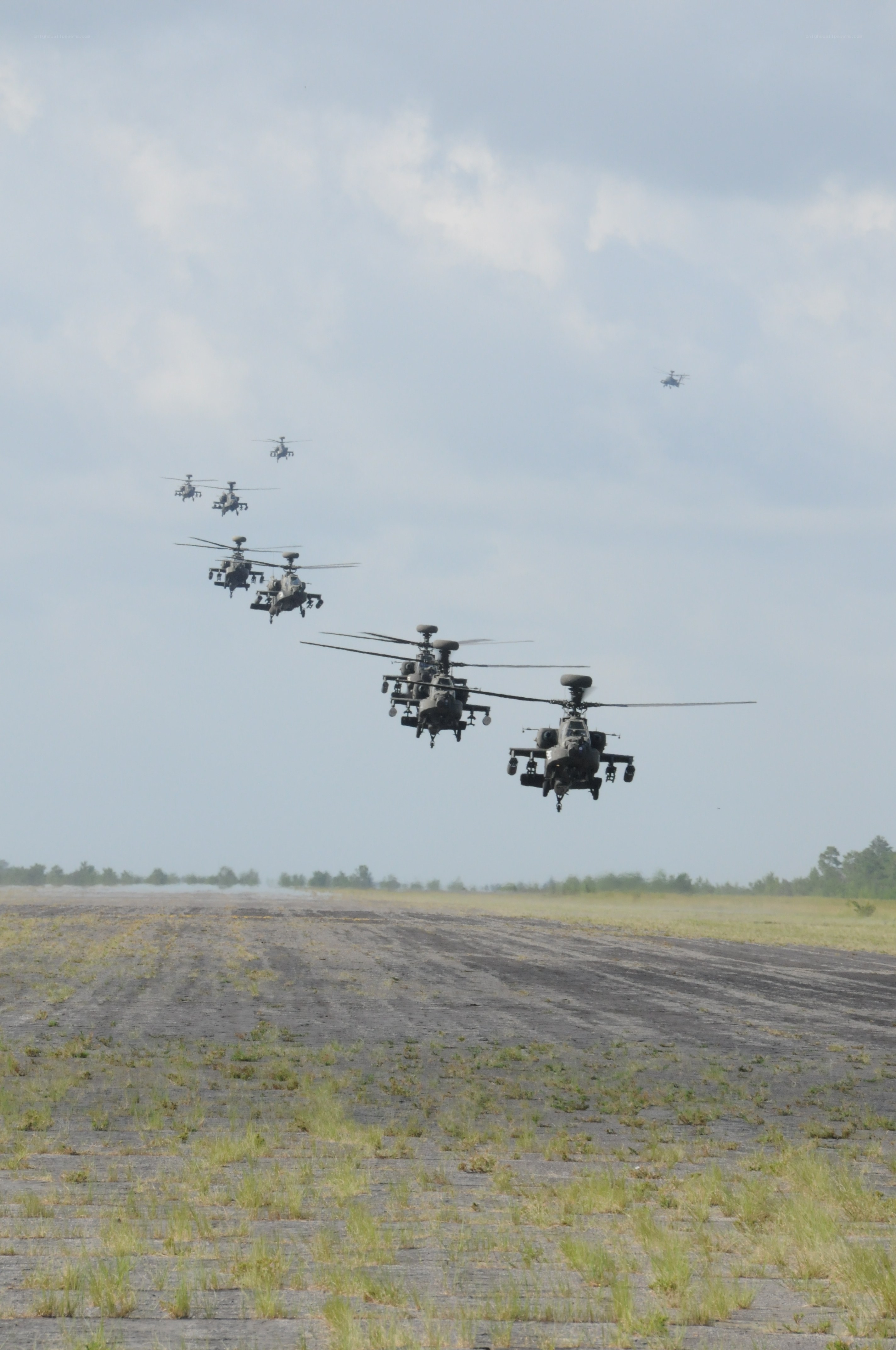 Apache helicopters in formation