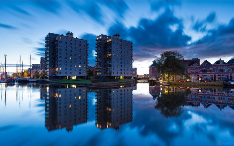 Apartment Buildings at Dusk — Blue
