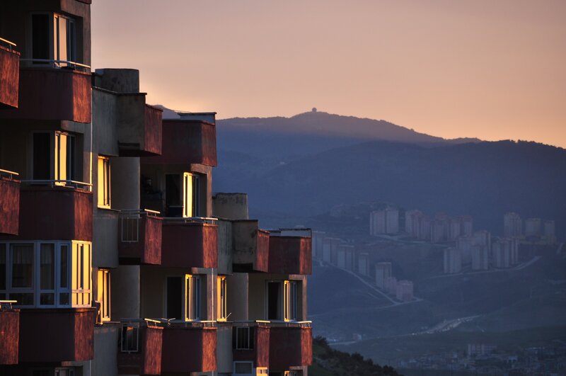 Apartment Buildings at Dusk — Orange, Serene