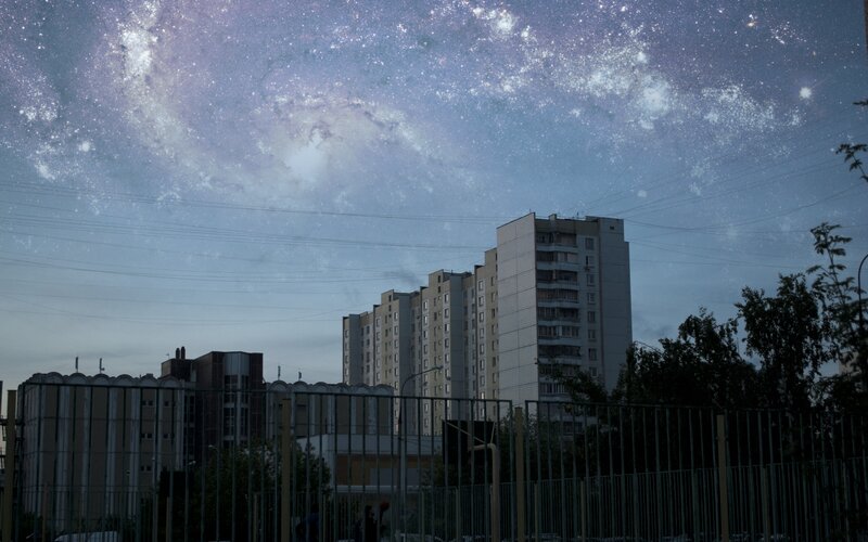 Apartment Buildings at Night — Blue