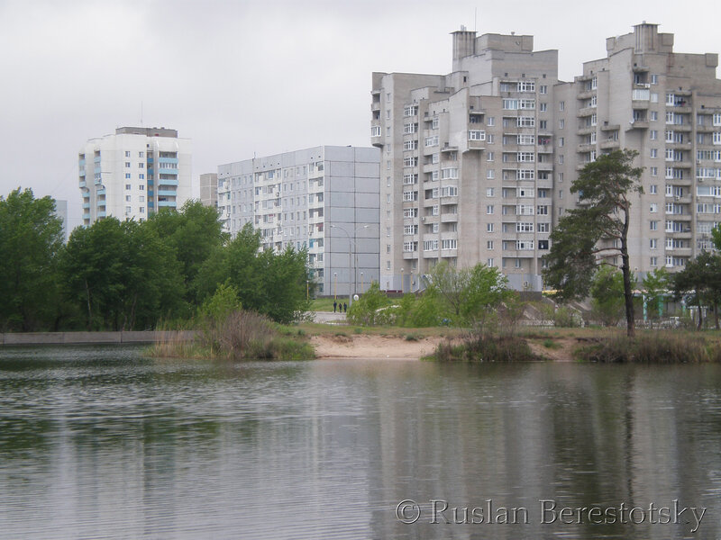 Apartment Buildings by Lake — Gray