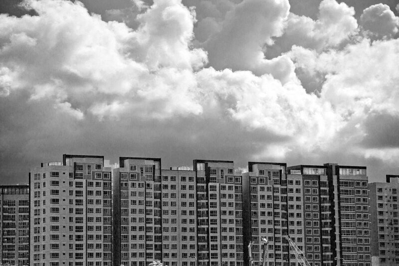 apartment buildings under cloudy sky