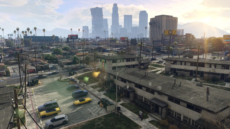 Apartment Complex with City Skyline