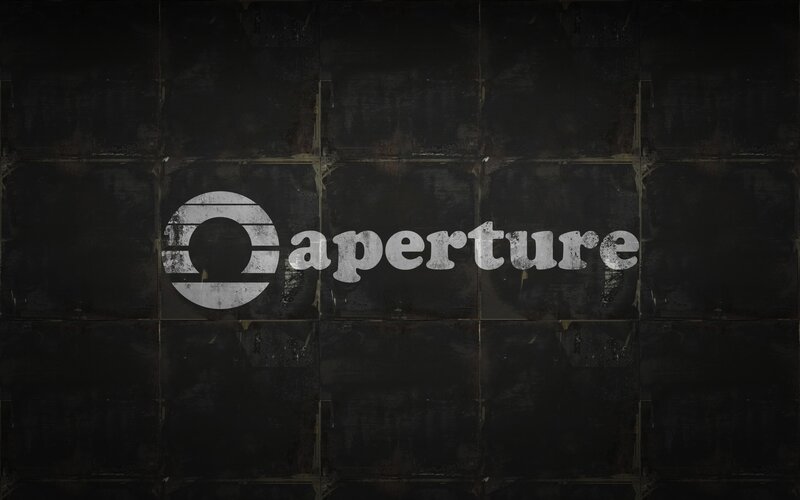Aperture logo on dark wall
