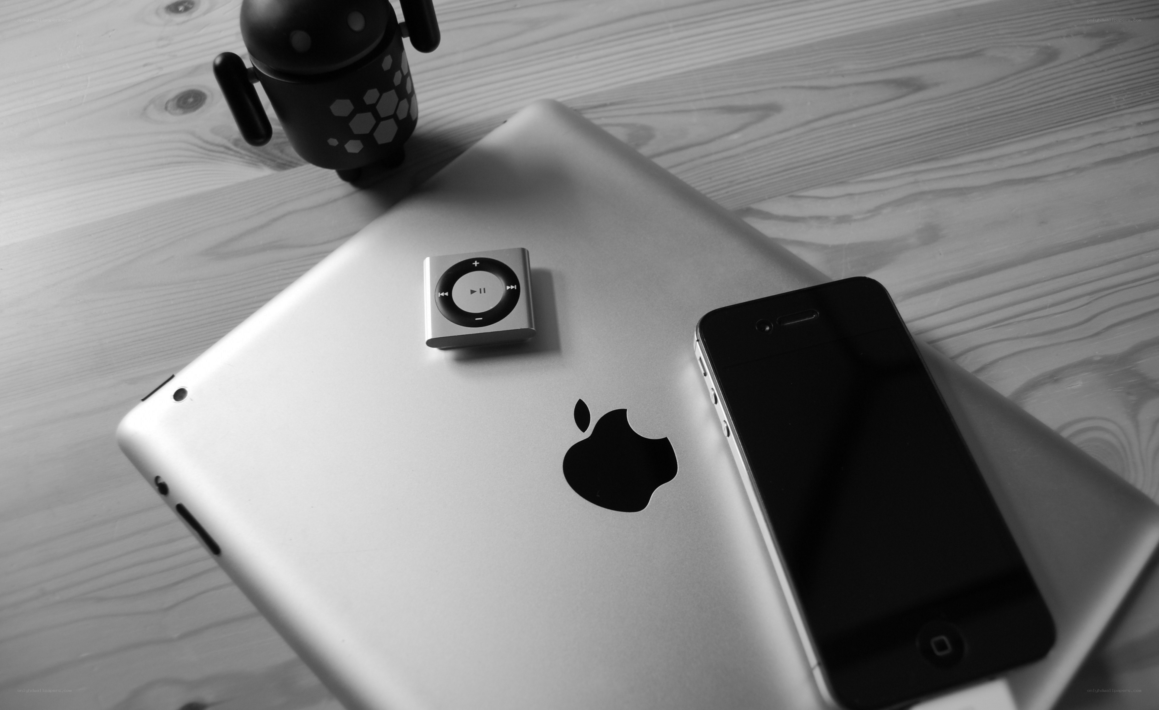 Apple and Android devices on table