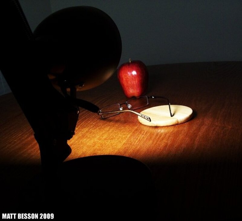 Apple and glasses on a table
