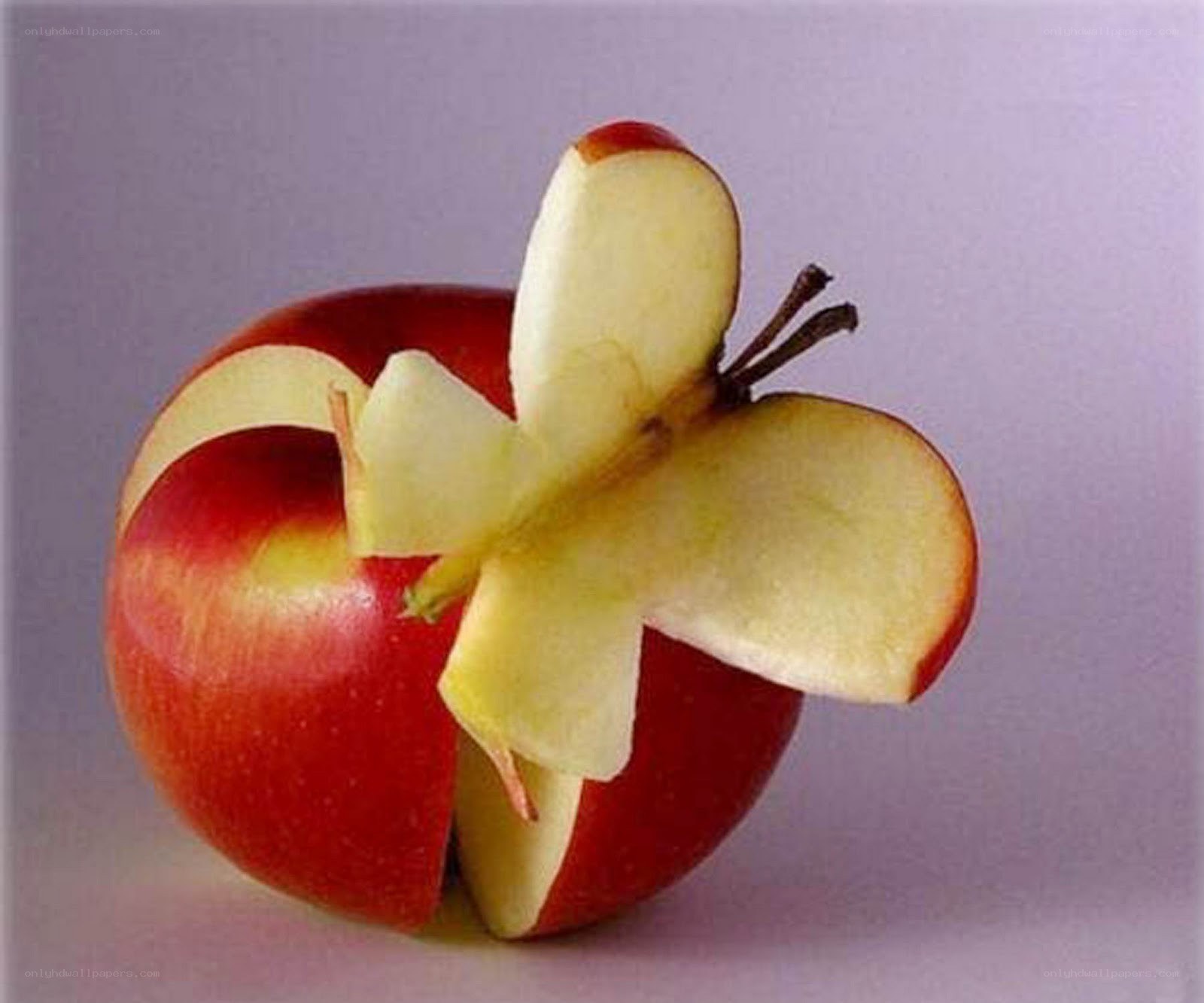 apple carved into a butterfly