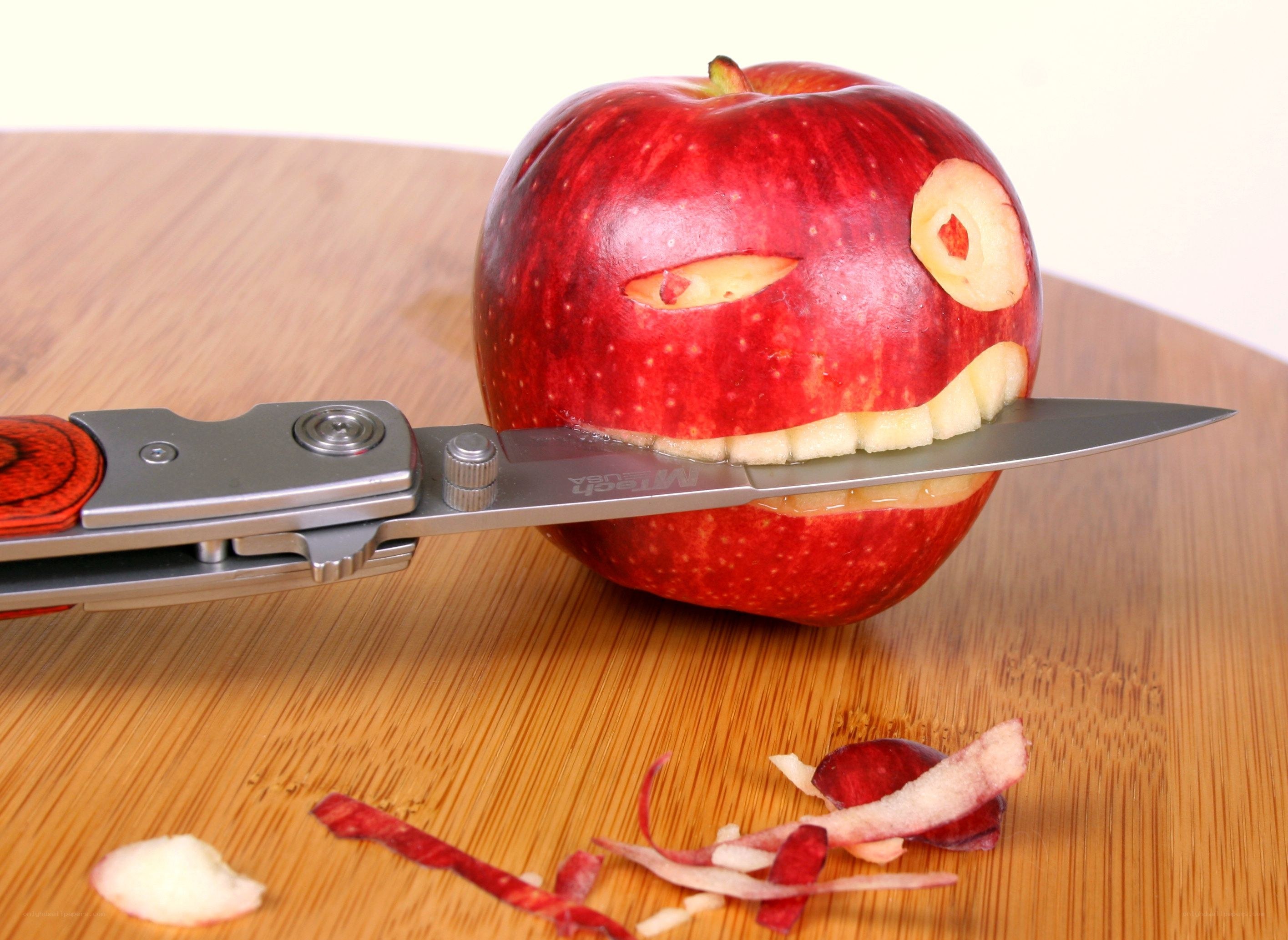 apple carved into face