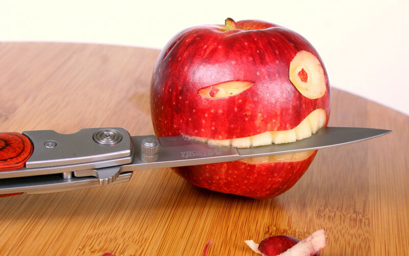 Apple Carved into Face — Red, Playful