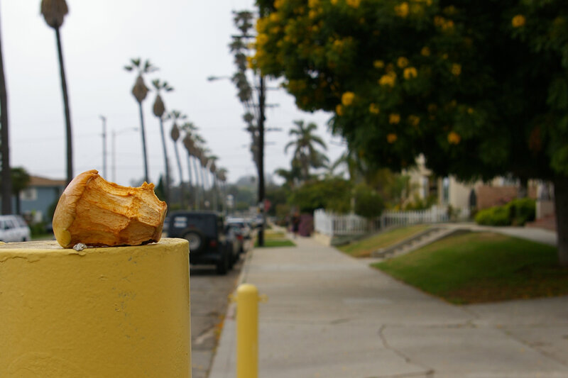 apple core on a yellow post