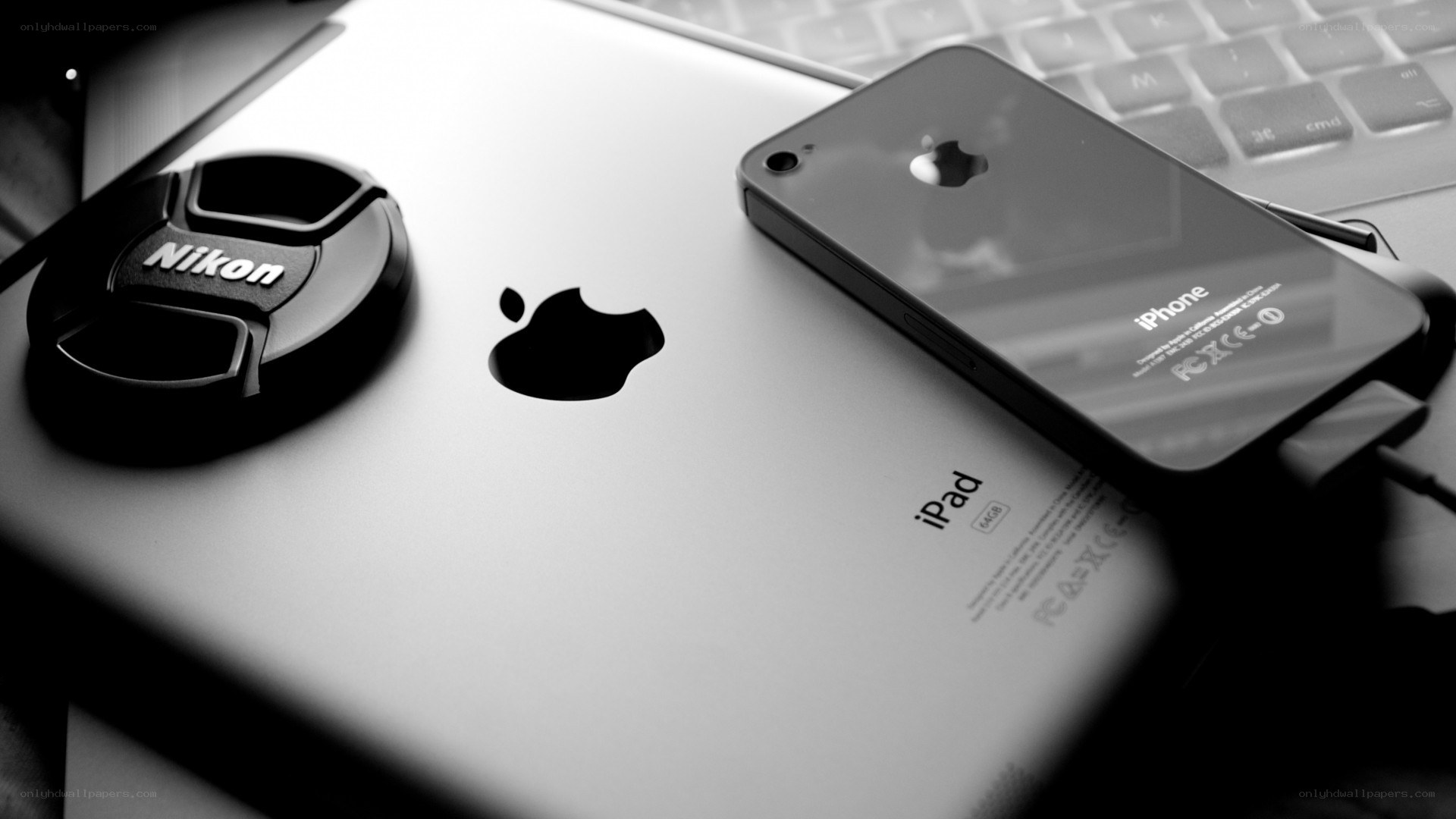 Apple devices and Nikon lens cap