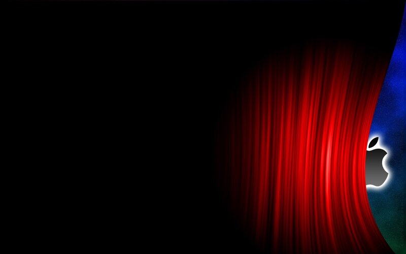 Apple logo behind red curtain