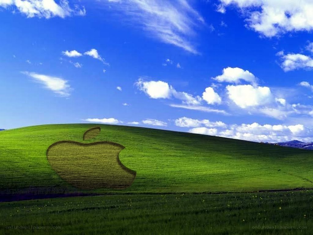 Apple logo in a green field