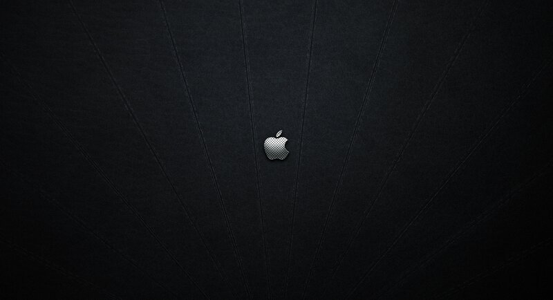Apple Logo on Black Surface — Dark