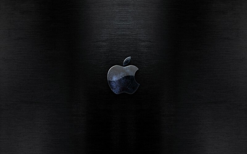 Apple logo on black surface