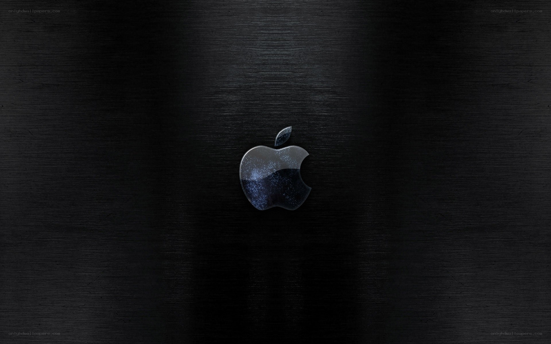 Apple logo on black surface