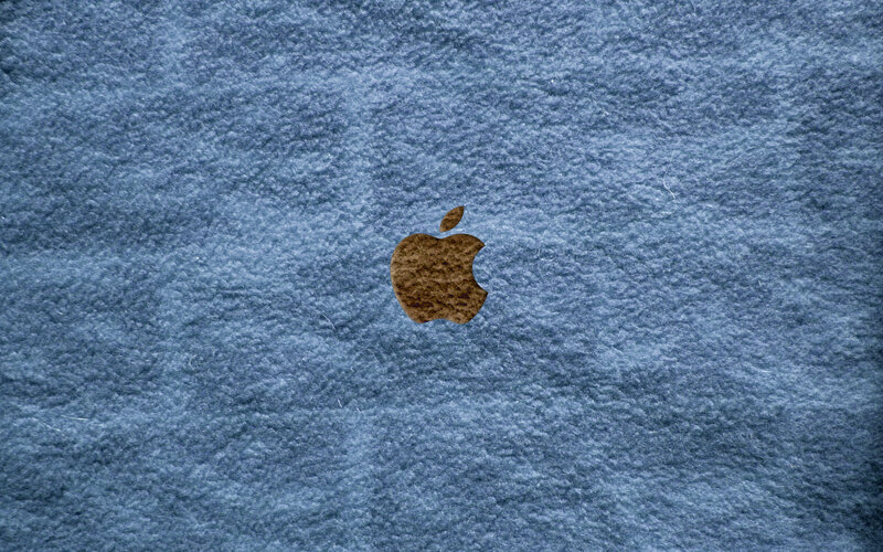 Apple logo on blue fabric