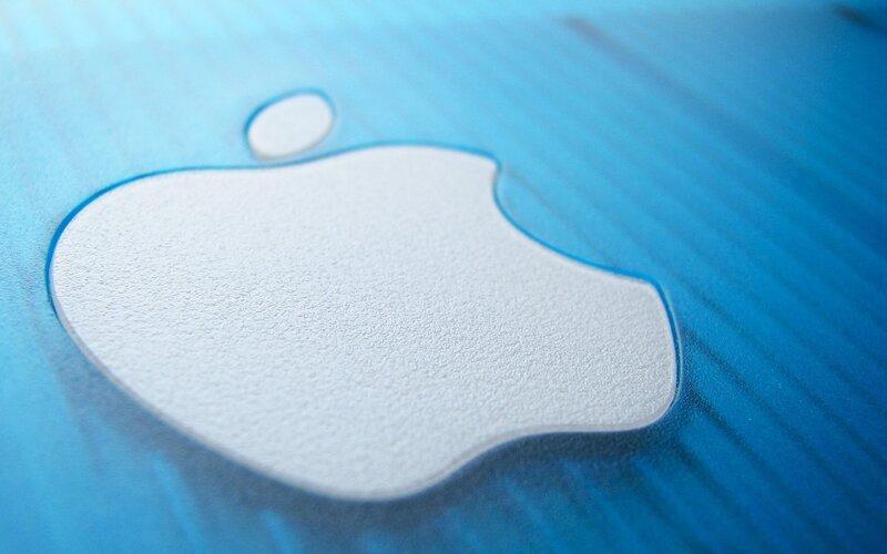 Apple logo on blue surface