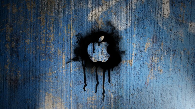 Apple logo on blue wall