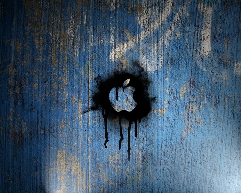Apple logo on blue wall