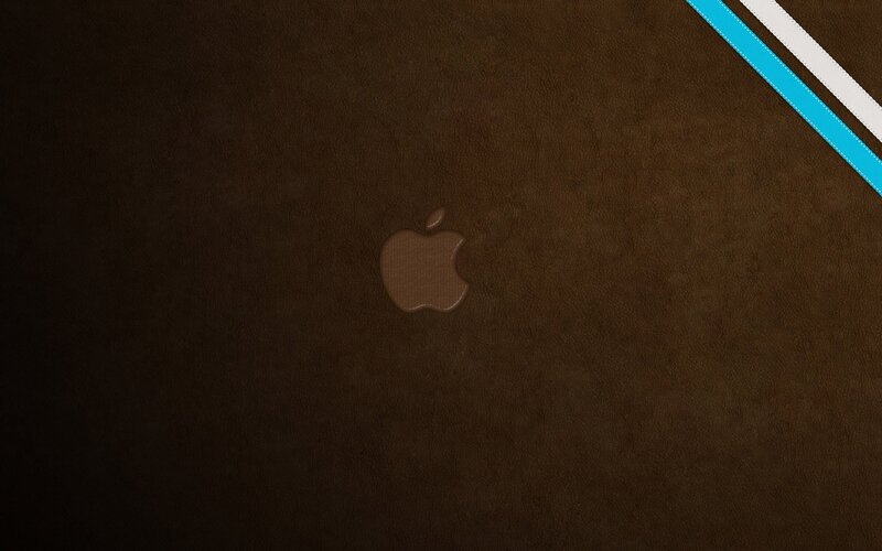Apple Logo on Brown Surface — Neutral