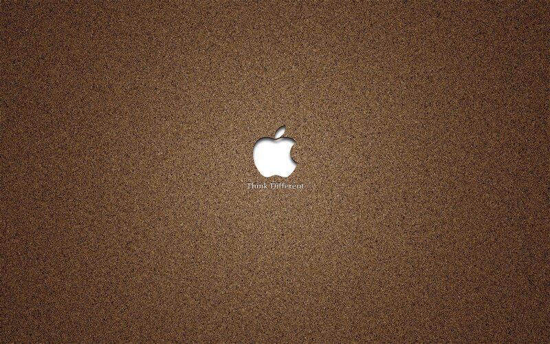 Apple Logo on Brown Surface