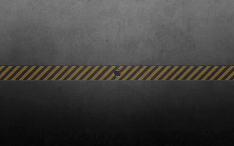 Apple logo on caution tape