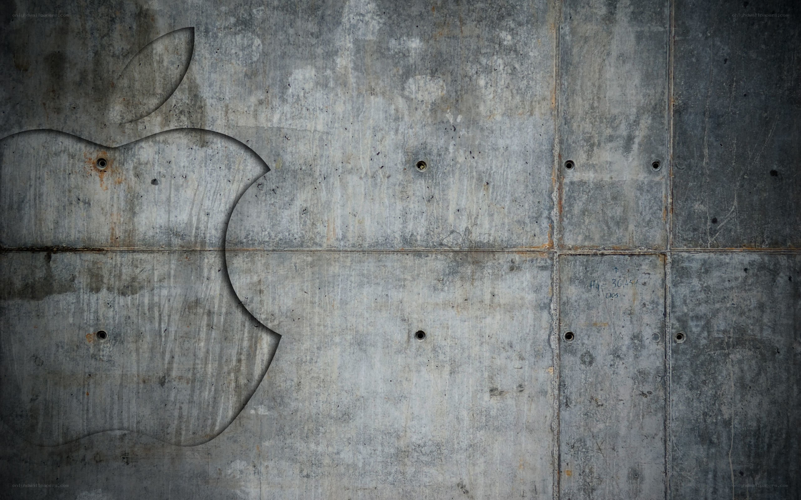 Apple logo on concrete wall