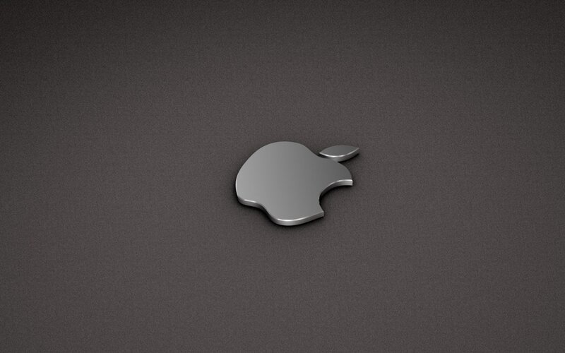 Apple logo on dark surface